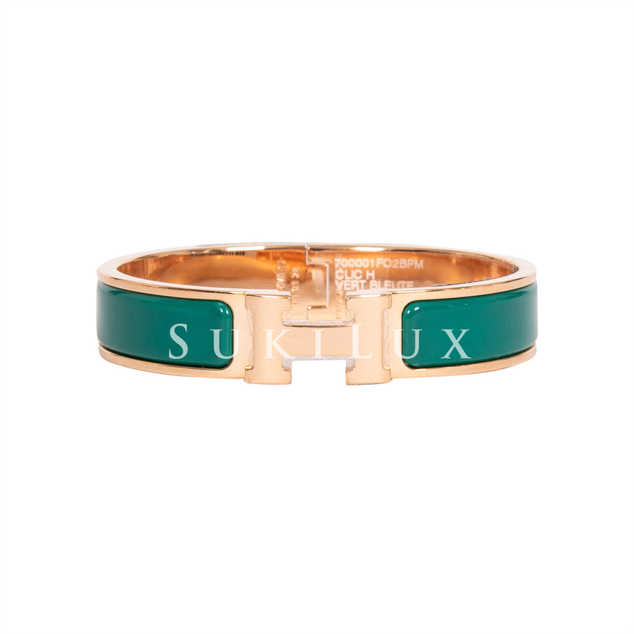 HERMÈS Bracelet Clic H in gilded metal and enamel of pi…